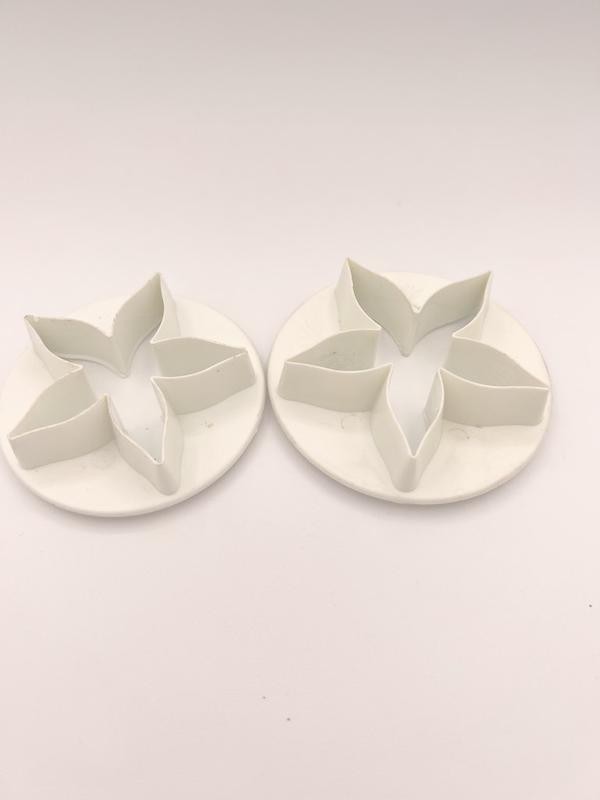 Plastica per uso alimentare, tagliabiscotti a forma di fiori rosa Prodotto usato