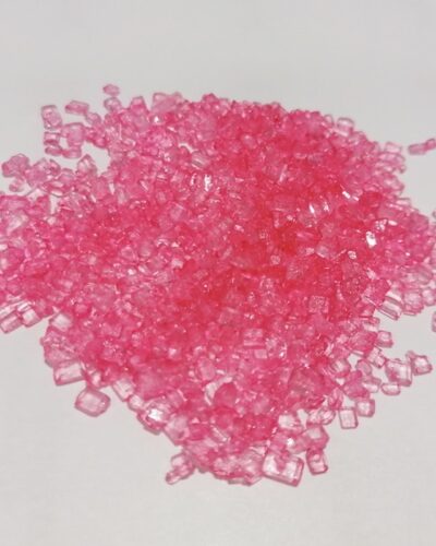 Sfiziosi cristalli di zucchero colorato rosa